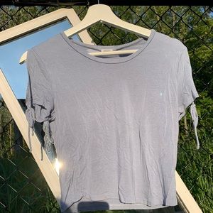 Blue shirt with shoulder ties